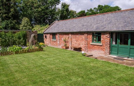 Secluded garden at The Workshop, a traditional, self-catering cottage located in Newton-on-the-Moor, Northumberland