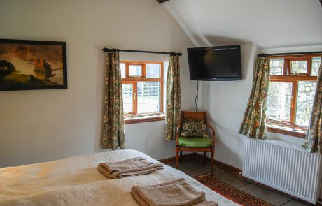 Bedroom at The Workshop, a traditional, self-catering cottage located in Newton-on-the-Moor, Northumberland
