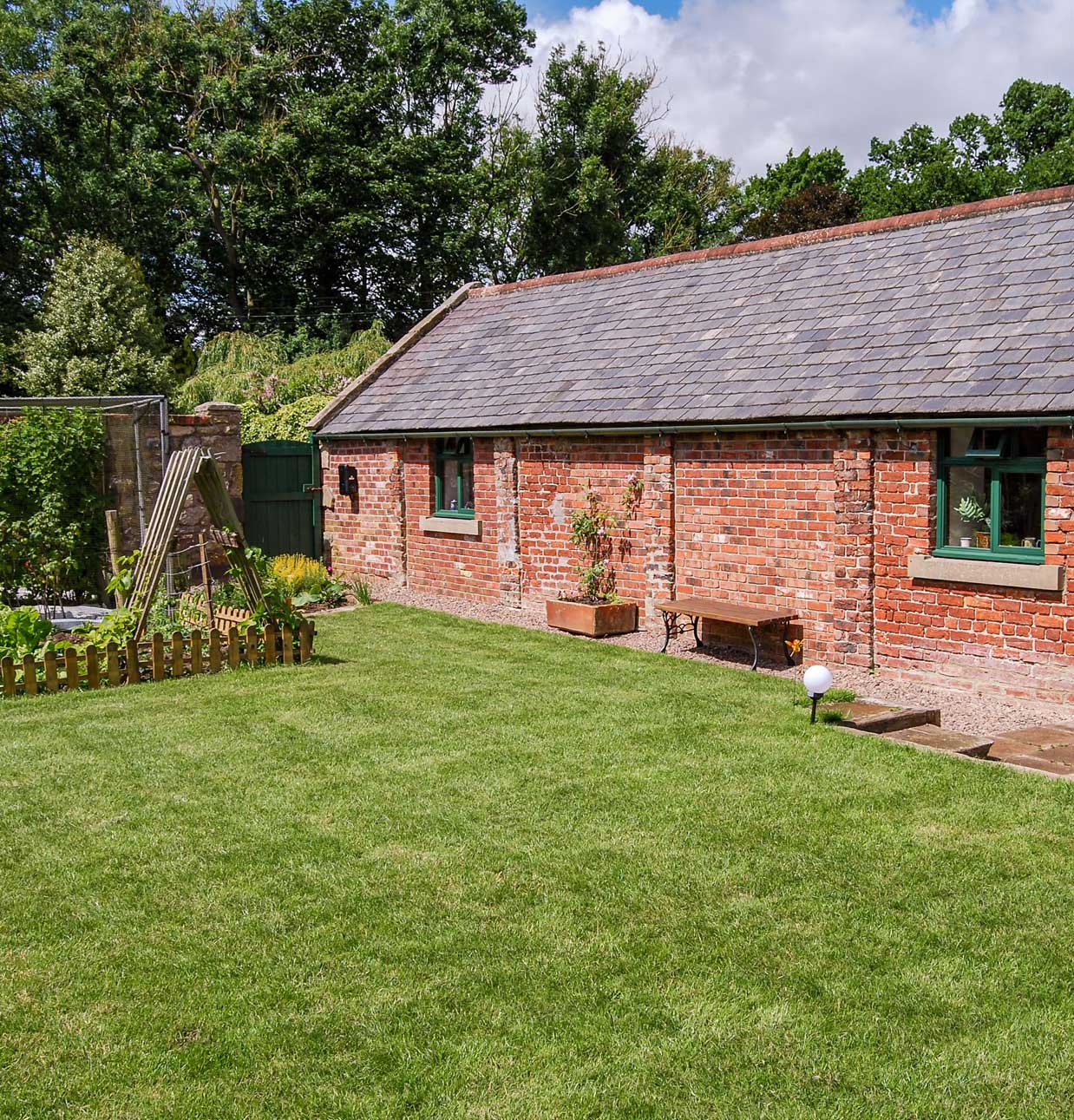Secluded garden at The Workshop, a traditional, self-catering cottage located in Newton-on-the-Moor, Northumberland